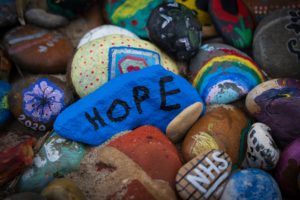 Hope written on one of the rocks in a pile of rocks